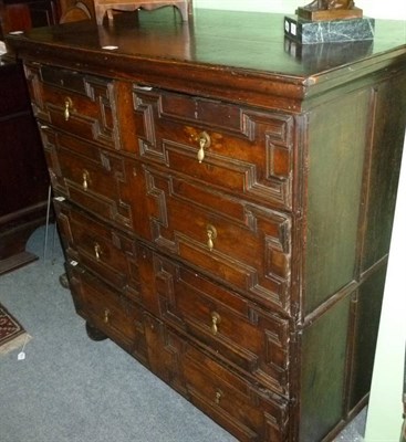 Lot 552 - A late 17th/early 18th century four height chest of drawers with moulded front and drop boil...