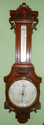 Lot 562 - Carved oak barometer