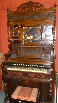 Lot 620 - A Victorian carved mahogany organ by Cornish and Co, and a piano stool