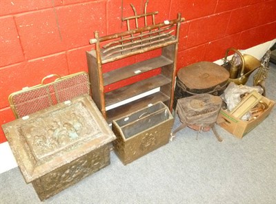 Lot 632 - A bamboo wall rack, brass spark guard, magazine rack and coal box