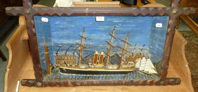 Lot 655 - A model of a ship in a glazed and framed case together with four Prisoner of War model ships in...