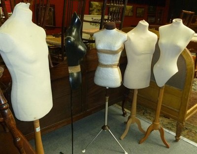 Lot 664 - Five modern mannequins on stands