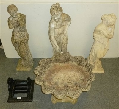 Lot 671 - Boot scrape, three garden statues and a bird bath