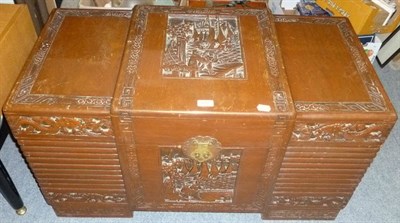 Lot 688 - A carved camphor wood blanket chest