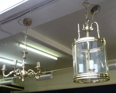 Lot 756 - Brass hall lantern and a set of four chandeliers