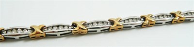 Lot 2 - A 9ct two colour gold diamond bracelet
