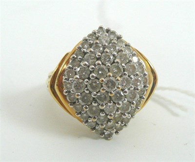 Lot 16 - An 18ct gold diamond cluster ring, total diamond weight 1.50 carat approximately