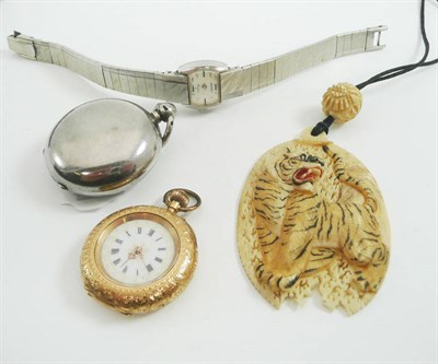 Lot 30 - Silver sovereign case, Seiko wristwatch, carved ivory pendant of a tiger and a ladies fob watch (4)