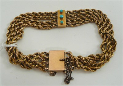 Lot 39 - 15ct gold four strand bracelet with turquoise mounts to clasp