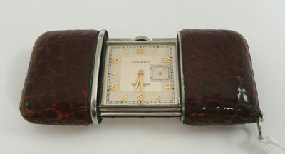 Lot 41 - # A purse watch, signed Movado, circa 1950, lever movement, case with sliding action, inner...