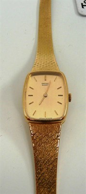 Lot 42 - # A lady's 18ct gold wristwatch, signed Seiko, circa 1975, quartz movement, gold coloured dial,...