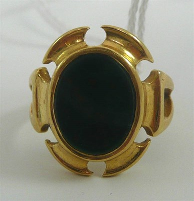 Lot 46 - # A bloodstone signet ring, the polished oval bloodstone in a cut-away setting, finger size M