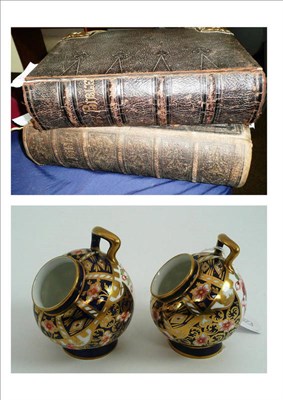Lot 67 - Two Crown Derby spoon warmers and two family Bibles