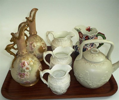 Lot 86 - Pair of Royal Bonn blush ivory ewers, graduated set of three vine jugs, Aesthetic-style teapot...