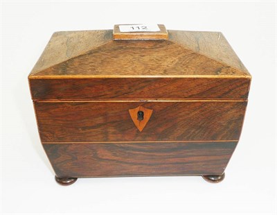 Lot 112 - # A Regency rosewood sarcophagus tea caddy, with handle loops, the hinged cover opening to...