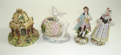 Lot 128 - Pair of late 19th century German figures, Staffordshire house ornament and a Moore Brothers...