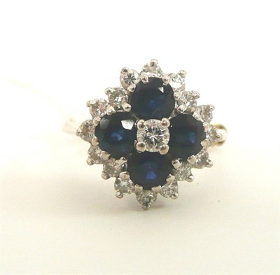 Lot 167 - Sapphire and diamond cluster ring