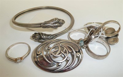 Lot 181 - Six silver rings, a bracelet and a brooch