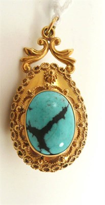 Lot 188 - # A spiderweb turquoise set pendant, of ornately decorated drop form, a cabochon turquoise...