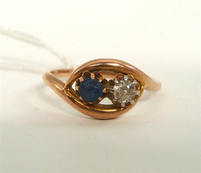 Lot 190 - A diamond and sapphire two stone ring