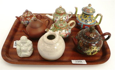 Lot 199 - Six miniature teapots including a cloisonné and a Canton famille rose example etc