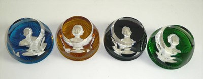 Lot 267 - A set of four Baccarat paperweights, Princess Anne, Duke of Edinburgh, Queen Elizabeth and...