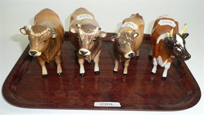 Lot 289 - Beswick Ayrshire cow, Jersey cow and two Jersey bulls (restorations)