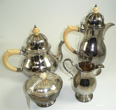 Lot 295 - A four piece silver tea set in Queen Anne style