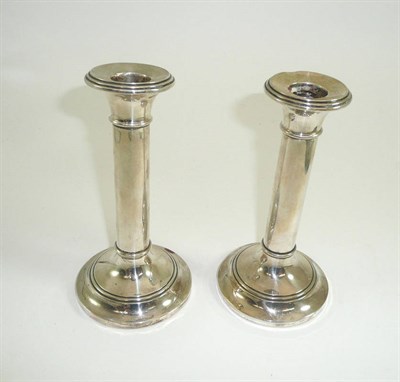 Lot 304 - Pair of silver candlesticks