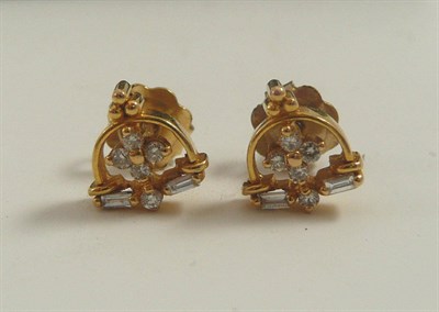 Lot 312 - A pair of 14ct gold diamond cluster earrings