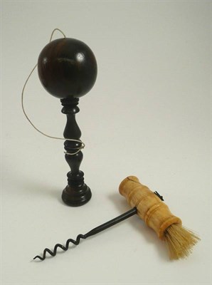 Lot 313 - A treen turned handle and a ball together with a corkscrew