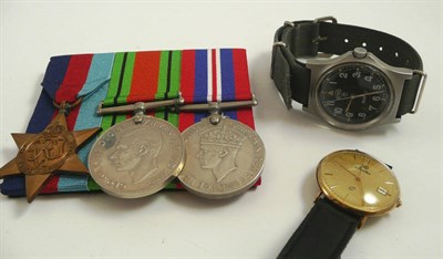 Lot 316 - Three second world war medals, gents wristwatch stamped 375 and a CWC military wristwatch