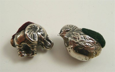 Lot 320 - # Two silver pin cushions, one as a chick one as an elephant