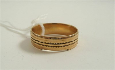 Lot 337 - An 18ct gold band ring (a.f.)