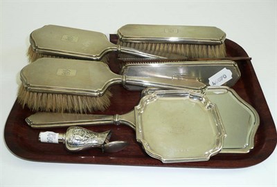 Lot 391 - # A six silver piece brush set, pair of silver ashtrays and a spirit pourer