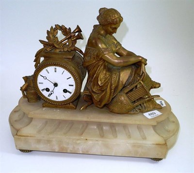 Lot 489 - A gilt metal striking mantel clock