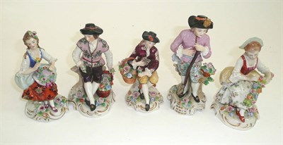 Lot 494 - # A Sitzendorf porcelain figure of a gardener, 20th century, in 18th century dress holding a spade