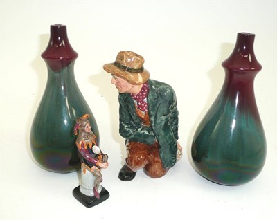 Lot 505 - A pair of Linthorpe pottery vases, Doulton figure HN2043 The Poacher and a miniature Doulton jester