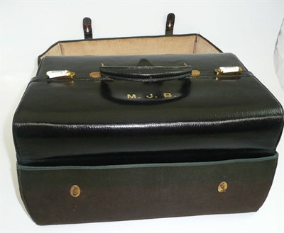 Lot 515 - A 19th century Gladstone style travelling case with outer cover