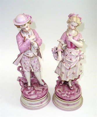 Lot 518 - # Pair of Victorian bisque figures of children in a buff pink glaze