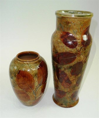 Lot 521 - Two Doulton leaf vases