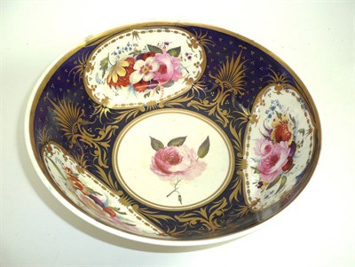 Lot 525 - A large 19th century English bowl decorated with flowers