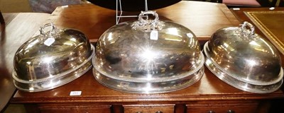 Lot 557 - # Three silver plated dome covers