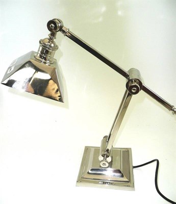 Lot 558 - A nickel plated (on brass) desk lamp on square base