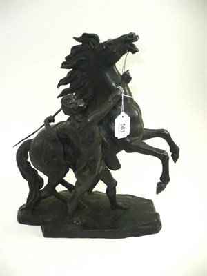 Lot 563 - A bronze Marley horse