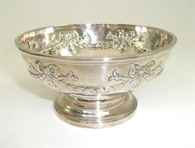 Lot 577 - A George II pedestal bowl, John Berthelot, London 1751, the circular bowl later embossed with...