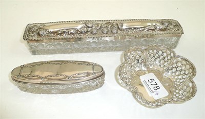 Lot 578 - Pierced silver bonbon dish and two cut glass dressing table boxes with silver mounts (3)