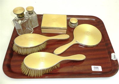 Lot 586 - A seven piece silver and yellow enamel dressing table set, each initialled 'e'