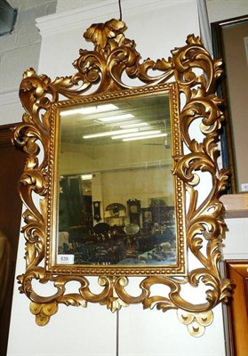 Lot 639 - # A carved giltwood Florentine style mirror