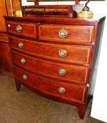 Lot 640 - # A Regency bow fronted mahogany chest